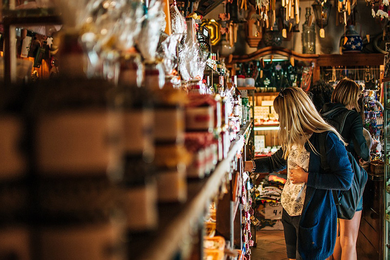 woman shopping in herbal market store